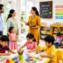 Parents touring a preschool classroom while learning about enrolling in preschool and early childhood education