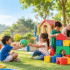 Children developing social skills through cooperative play and group activities in preschool