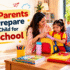 Indian parents helping their young child prepare a school bag for the first day of preschool.